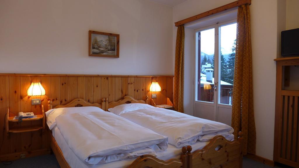Hotel Bellaria - Кортіна-д'Ампеццо Номер фото